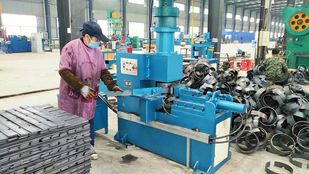 Handle/foot ring rolling machine for LPG cylinder manufacturing